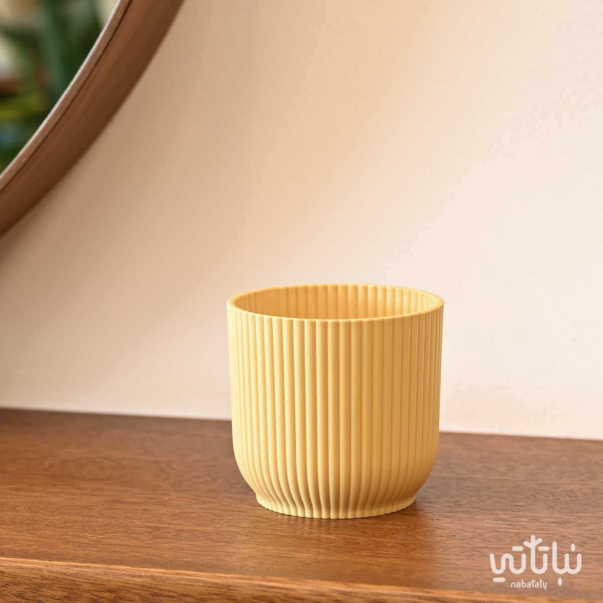 حوض بلاستيك دائري مخطط اصفر فاتح 9 سم 1